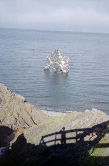 Hvtserkur photographed from the viewing platform with the shadow of the platform visible