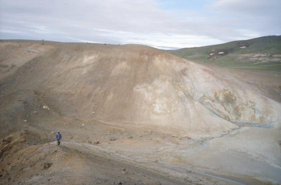 Gordon walking between the smaller crater and Vti - the larger crater