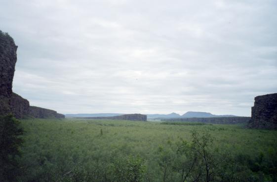 A view outward inside sbyrgi showing the horseshoe shape of the valley