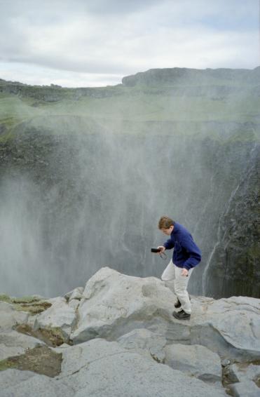 Dave near the edge of the rocks with his camera