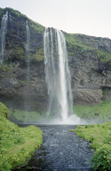 The waterfall from the bridge crossing the river