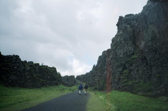 Dave and Gordon walking down the path at ingvellir